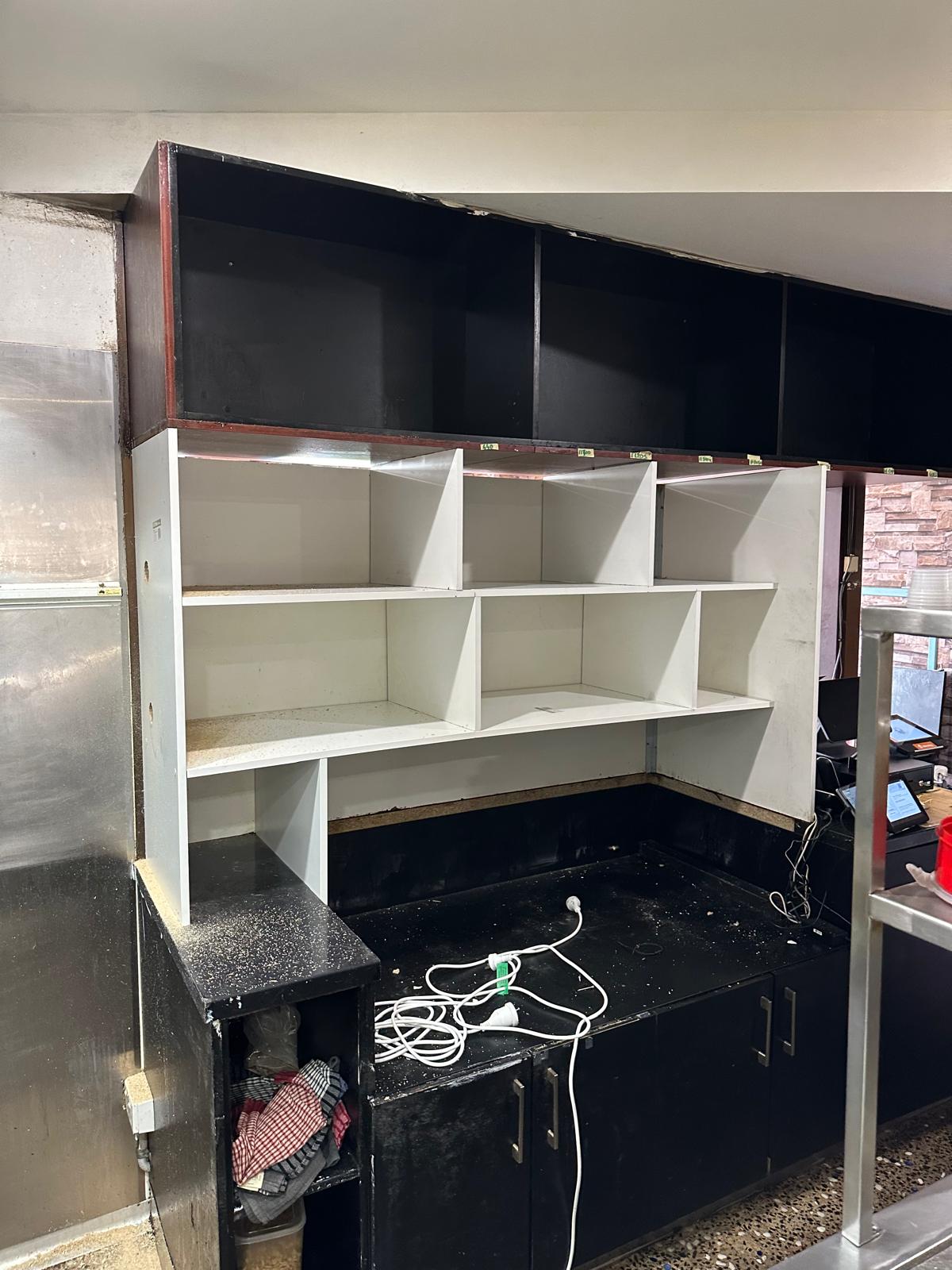 Commercial built-in renovation with compartment storage.